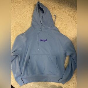 Poppi Light Blue Hoodie with Purple Logo